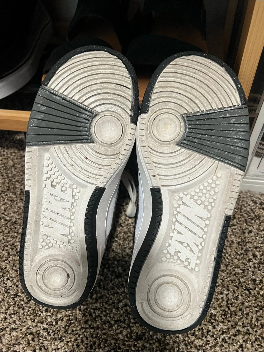 Nike Women's White Sneakers with Black Swoosh